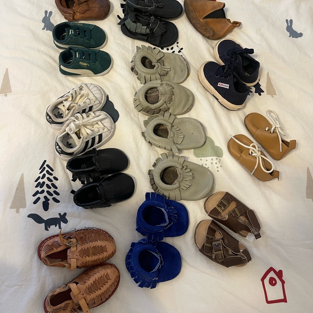 15 pairs of baby walker toddler name brand shoes.